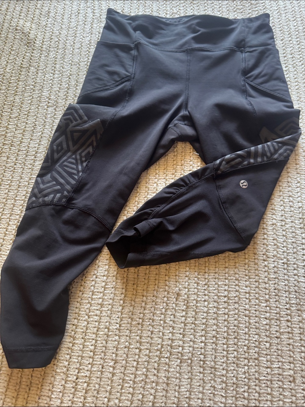 lululemon black athletic leggings with subtle patterned panel